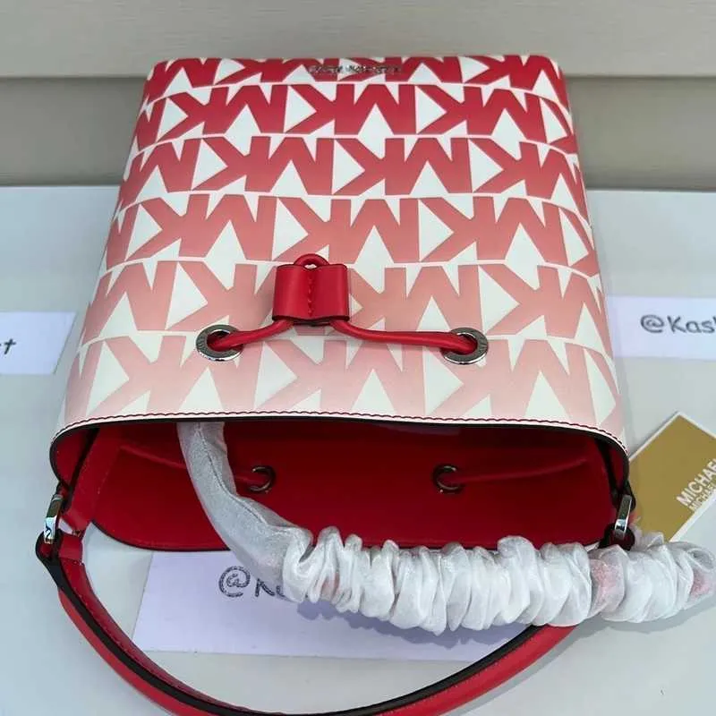 Suri Medium Graphic Logo Print Faux Leather Crossbody Bag