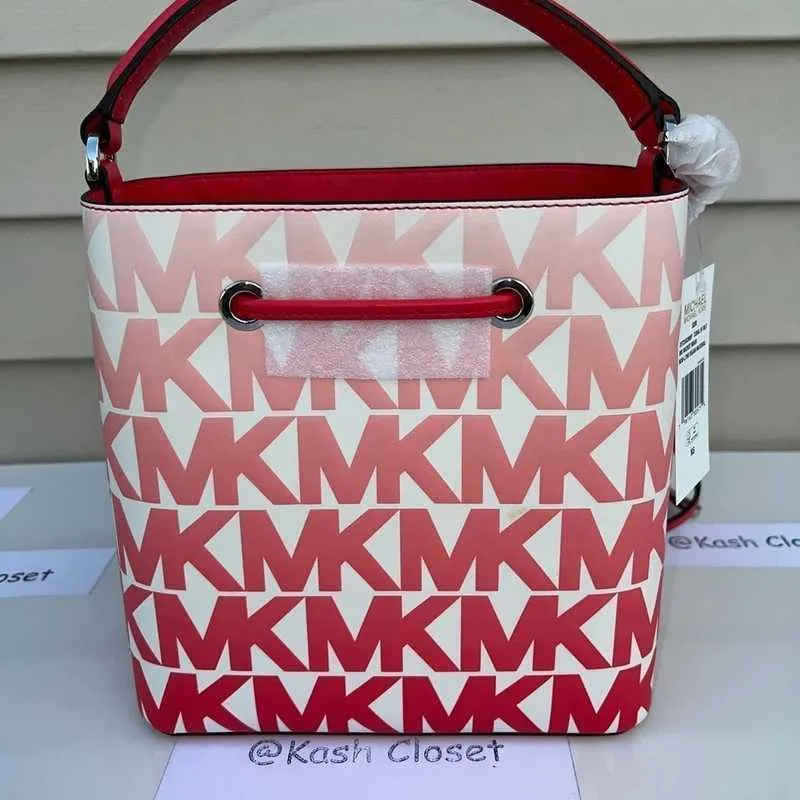 Suri Medium Graphic Logo Print Faux Leather Crossbody Bag